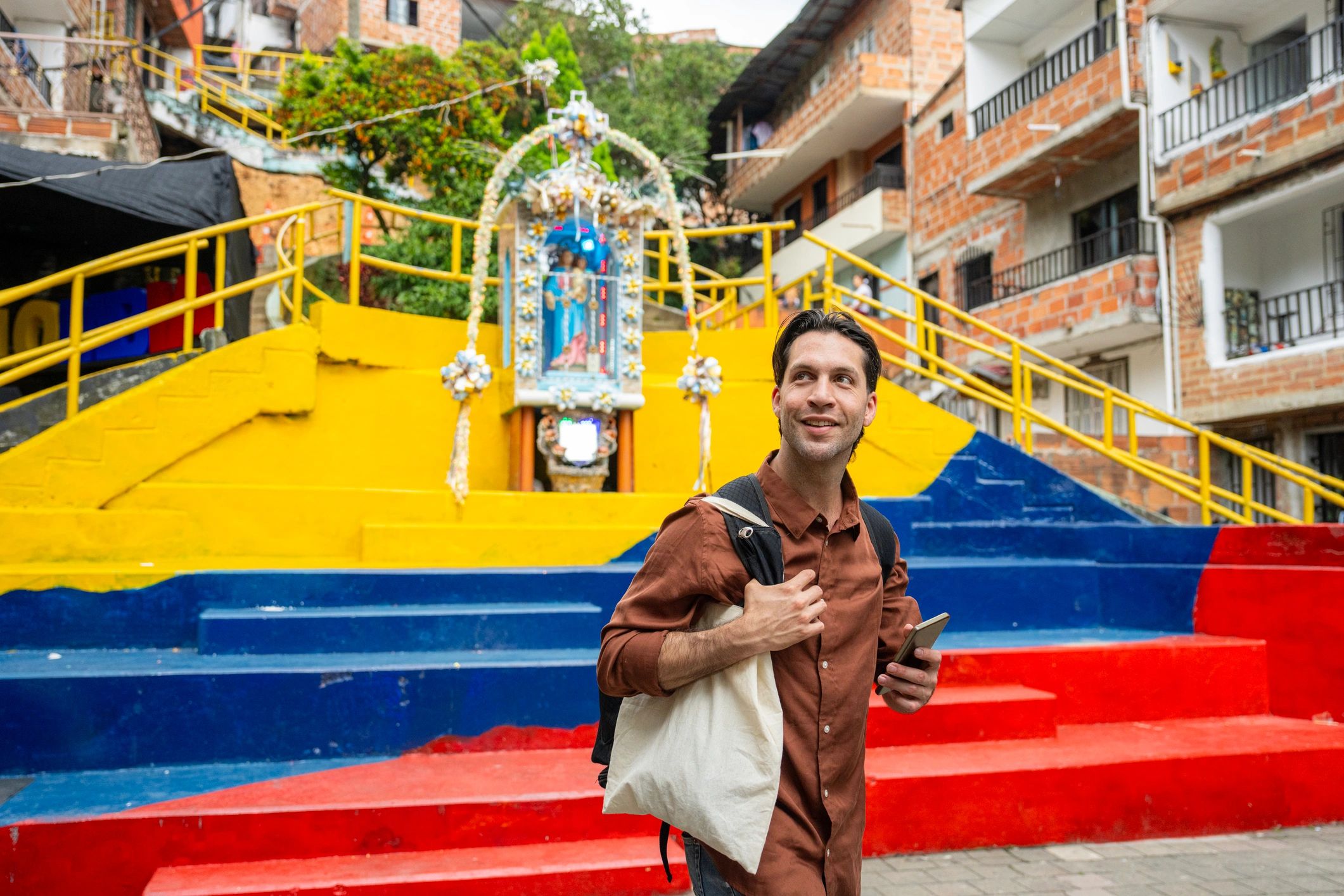 Traveler exploring Medellin, Colombia with local guidance