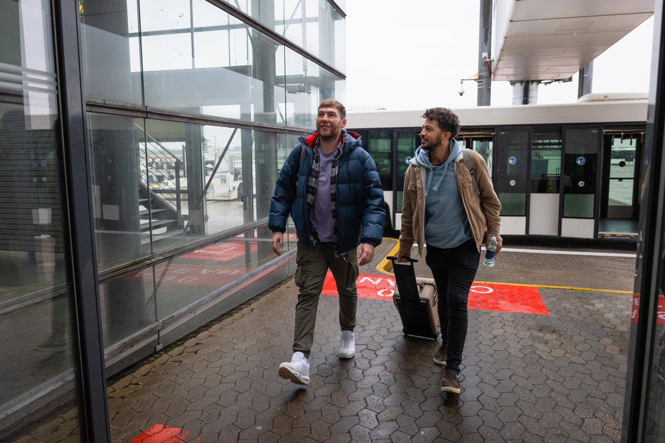 Travelers receiving assistance at the airport